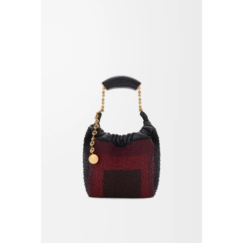 Mini Squeeze bag in beaded leather