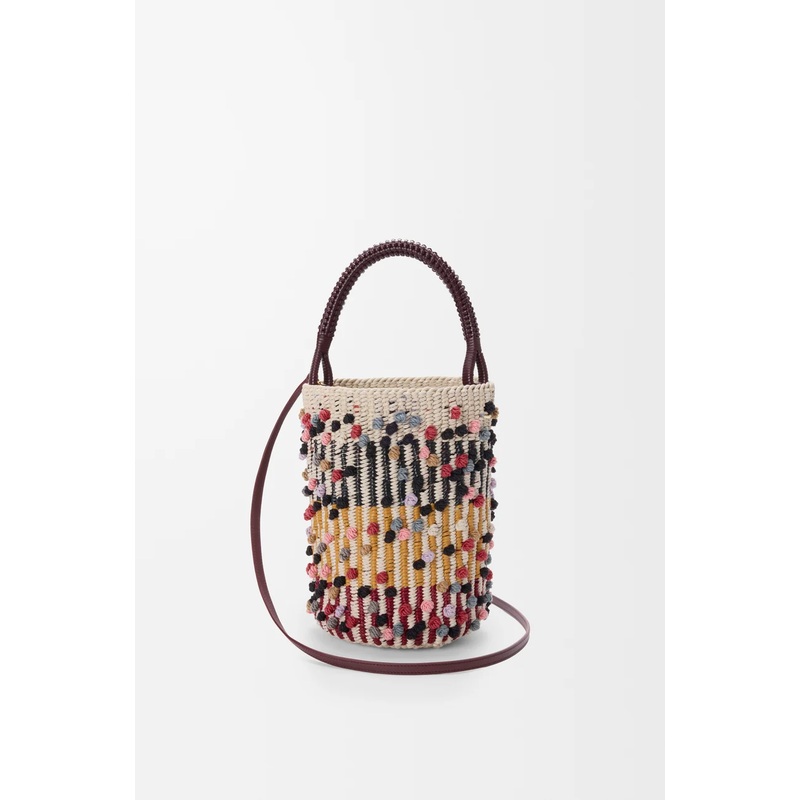 Bucket in cord, leather and wool