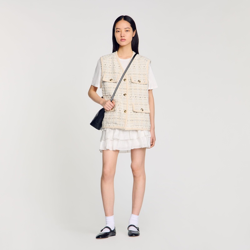 Sleeveless tweed jacket