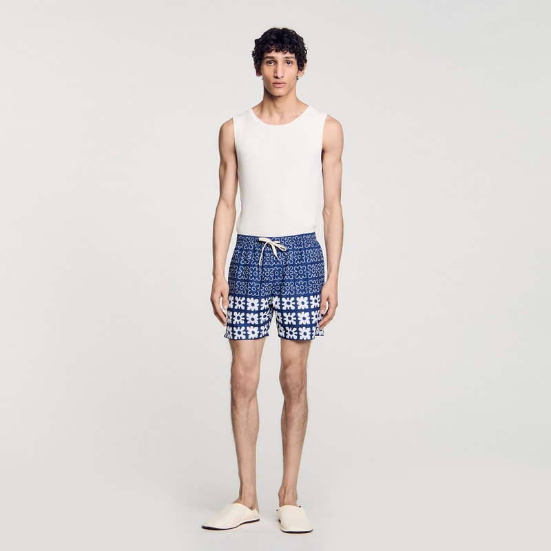 Floral print swim trunks