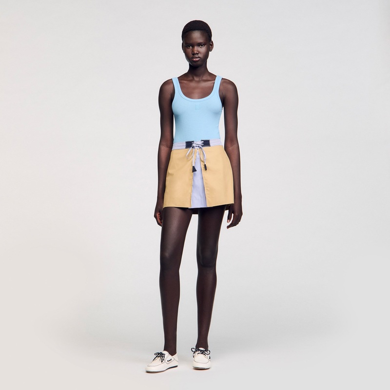 Mini dual-material skirt