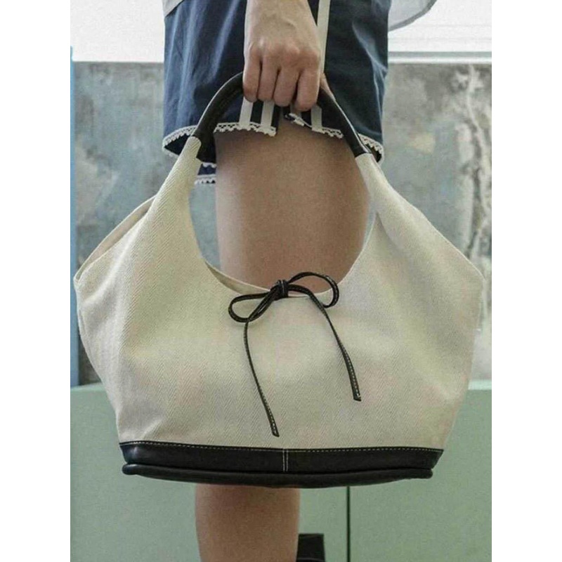 StyleCast x Revolte Women Solid Structured Handheld Bag