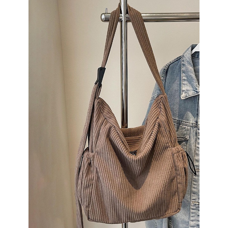 StyleCast Checked Structured Handheld Bag with Tasselled