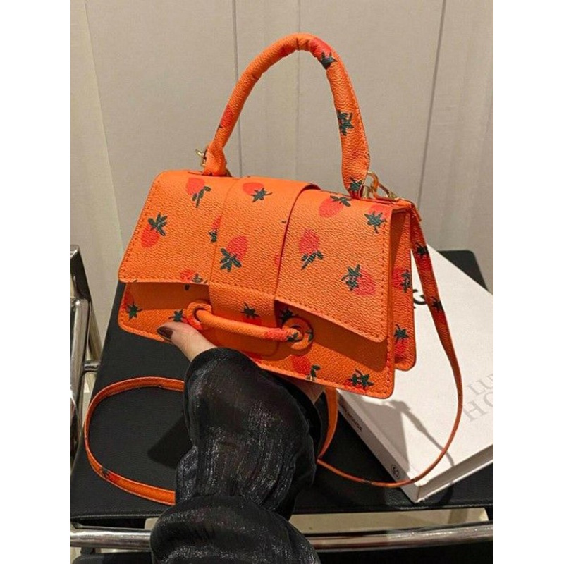 StyleCast Printed Bucket Handheld Bag with Tasselled