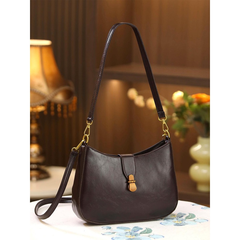 Diva Dale Women Solid Structured Tasselled Sling Bag