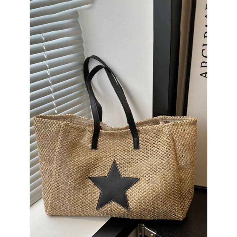 StyleCast Textured Bucket Handheld Bag with Tasselled