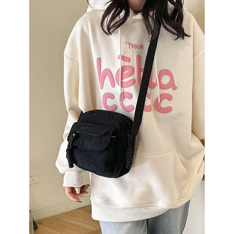 StyleCast x Revolte Bowling Sling Bag