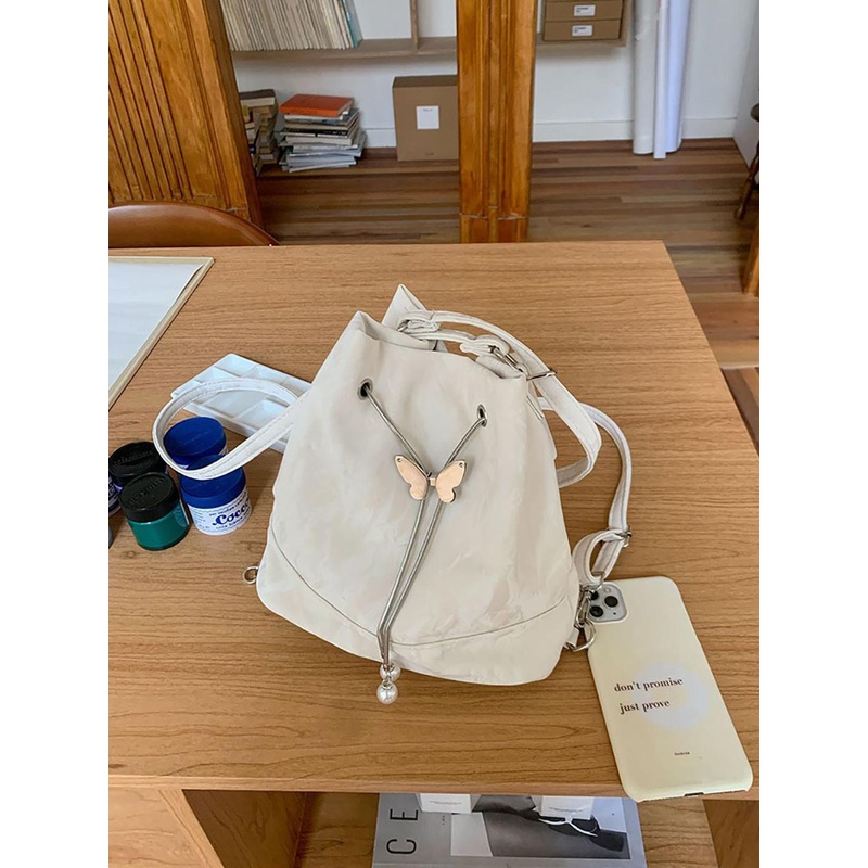 StyleCast x Revolte Women Solid Bucket Sling Bag