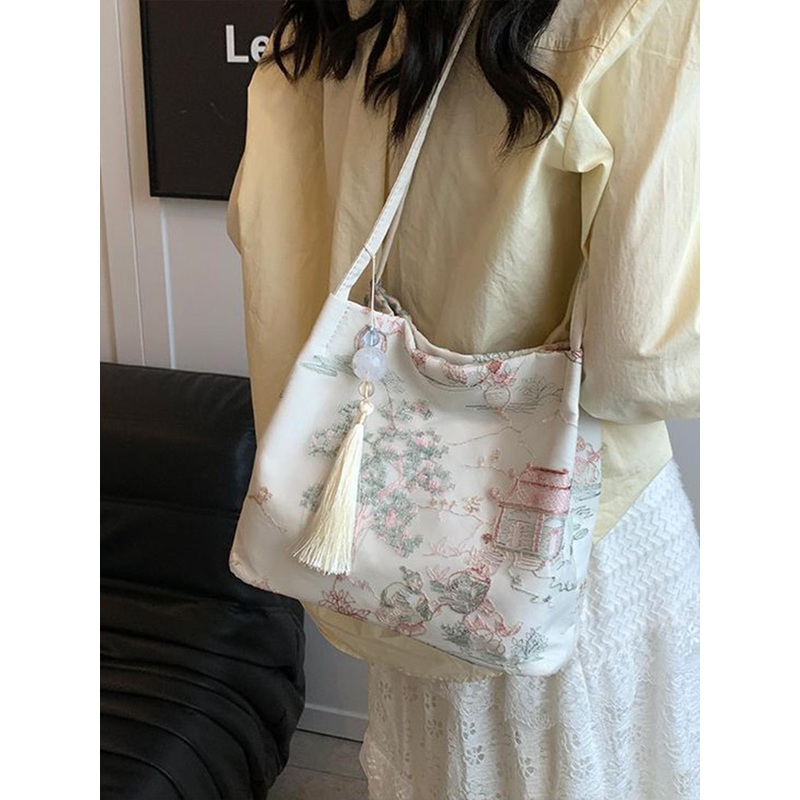 StyleCast x Revolte Printed Structured Sling Bag