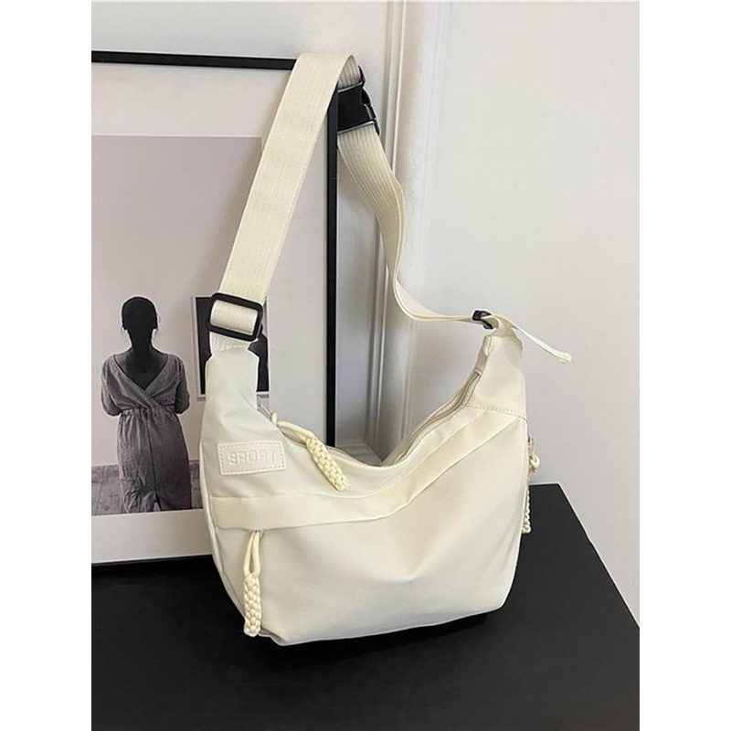 StyleCast x Revolte Half Moon Sling Bag