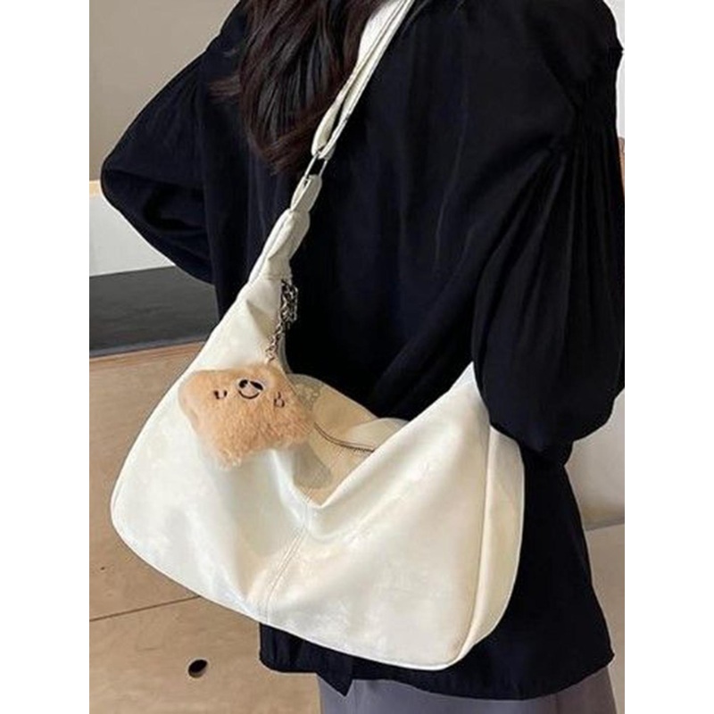 StyleCast Textured Structured Handheld Bag with Tasselled