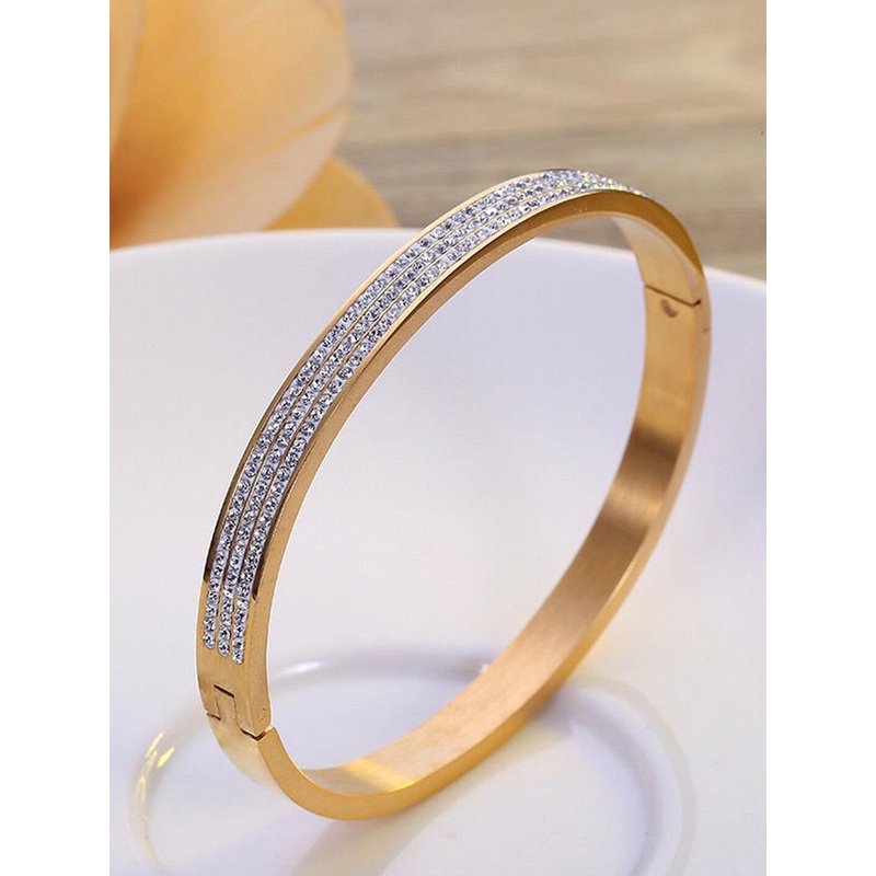 Jewels Galaxy Gold Plated AD Studded Stainless Steel Bangle Style Bracelet