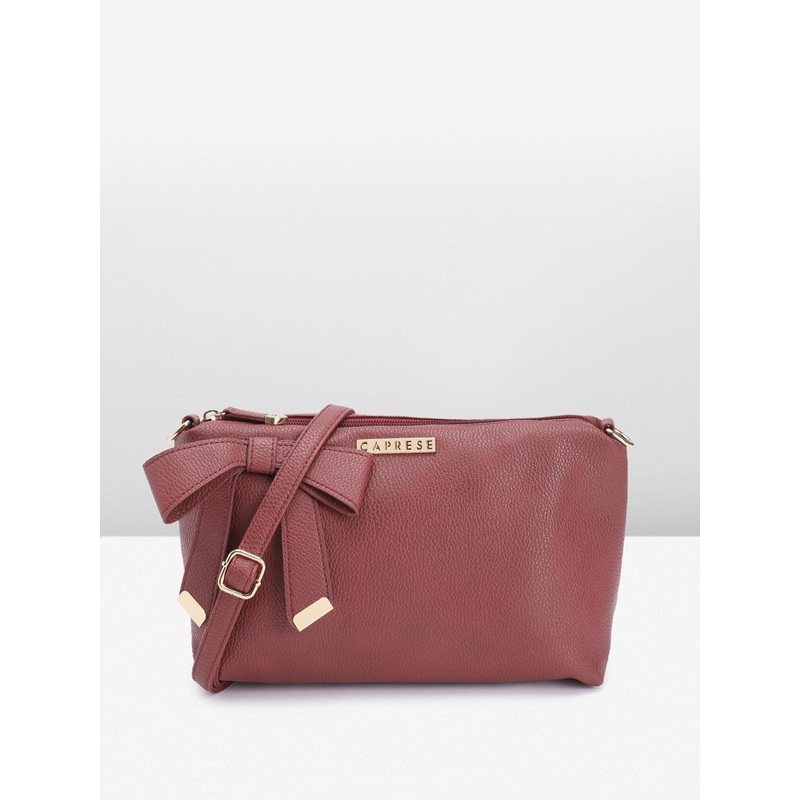 Caprese Abstract Textured Sling Bag with Bow Detail