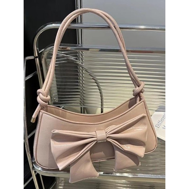 StyleCast Bucket Handheld Bag with Bow Detail