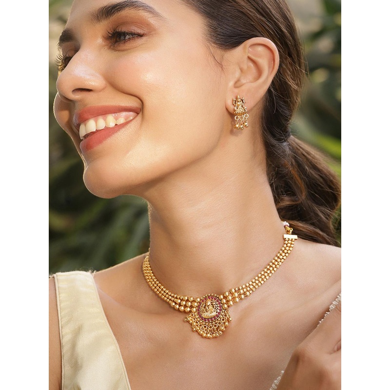 Rubans 22K Gold Plated Ruby Studded Gold Beaded Goddess Laxmi Motif Temple Jewellery Set