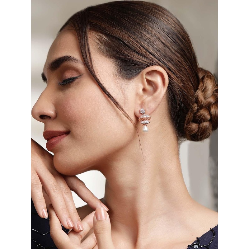 Rubans Rose Gold Plated Cubic Zirconia Studded White Beaded Floral Jhumka Earrings